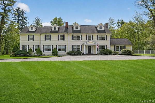 2.73 Acres of Land with Home for Sale in Muttontown, New York