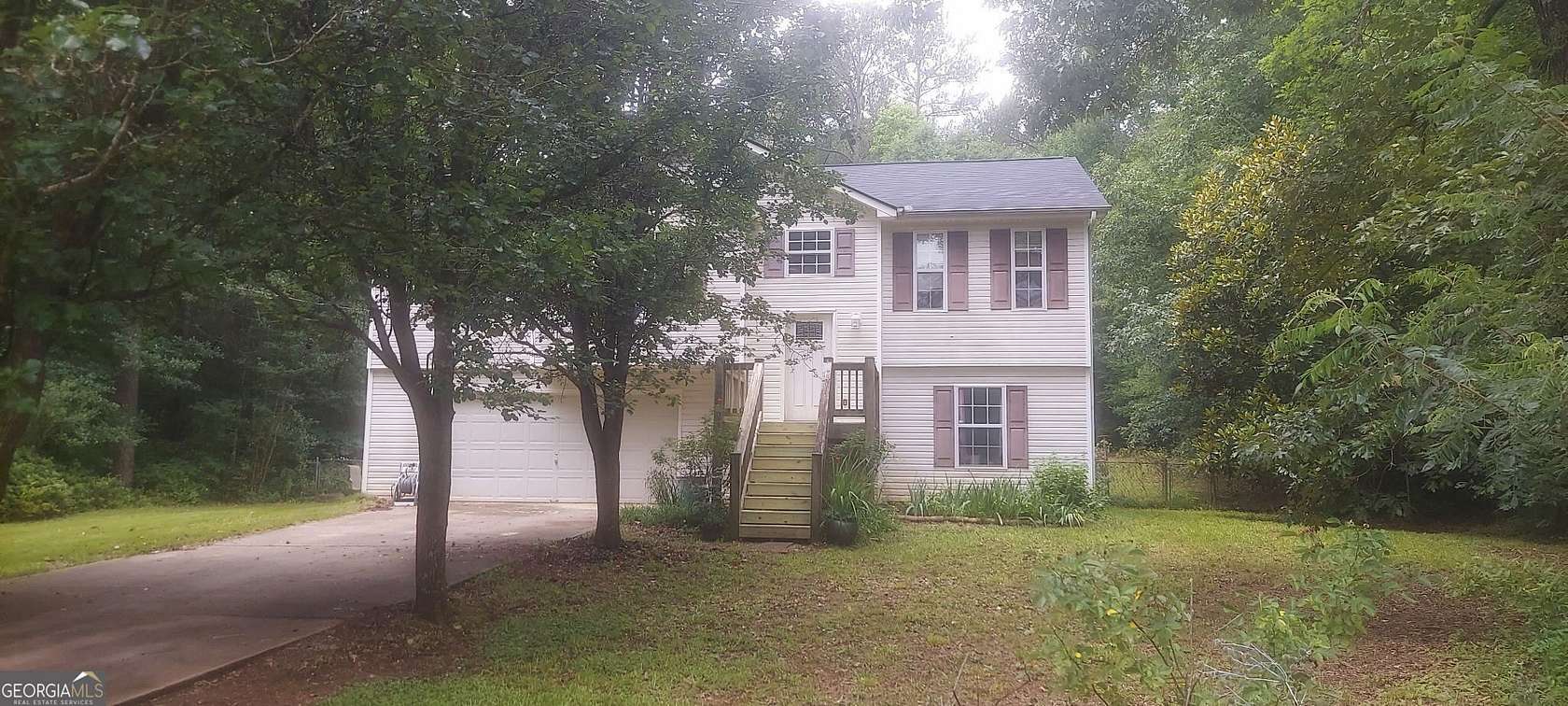 1.5 Acres of Land with Home for Sale in Covington, Georgia