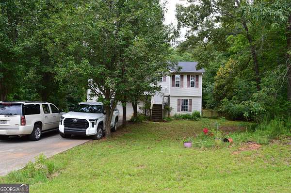 1.5 Acres of Land with Home for Sale in Covington, Georgia