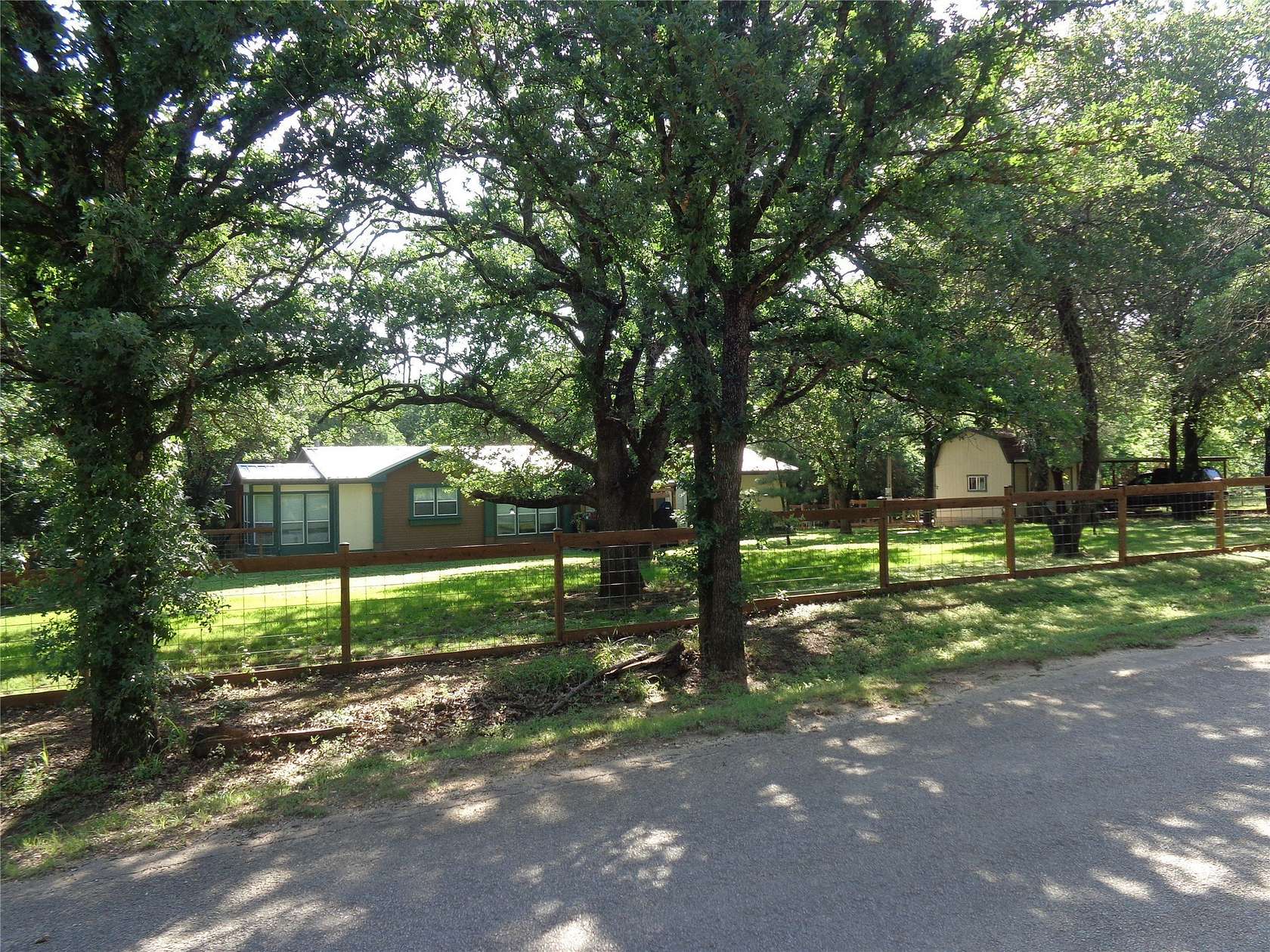 2.59 Acres of Land with Home for Sale in Grandview, Texas