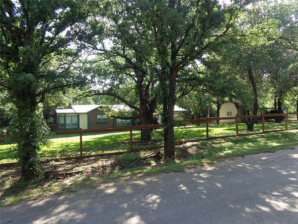2.59 Acres of Land with Home for Sale in Grandview, Texas