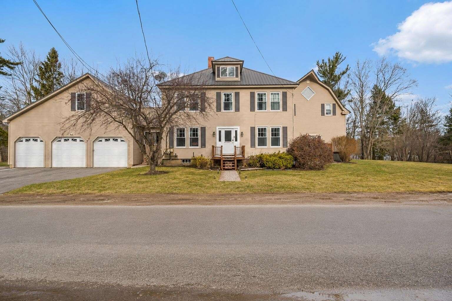 1.85 Acres of Land with Home for Sale in West Paris, Maine