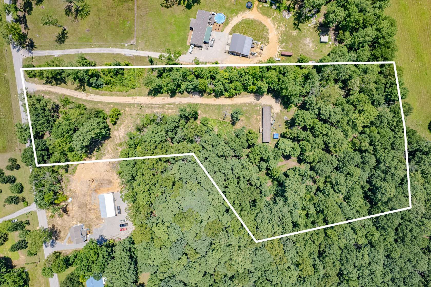5.16 Acres of Land with Home for Sale in Primm Springs, Tennessee