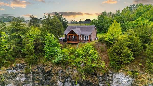 27.2 Acres of Recreational Land with Home for Sale in Columbia, Kentucky