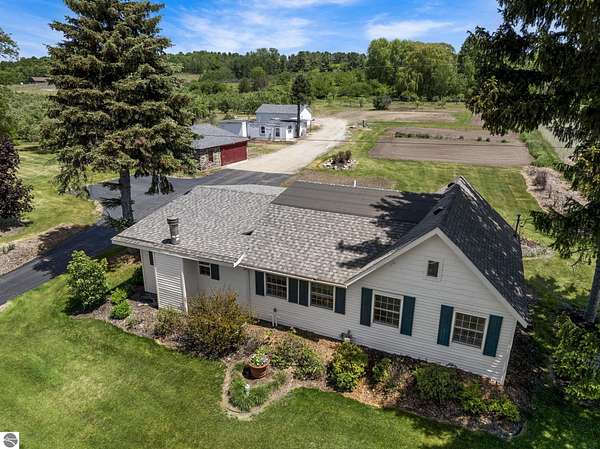 23.3 Acres of Agricultural Land with Home for Sale in Traverse City, Michigan