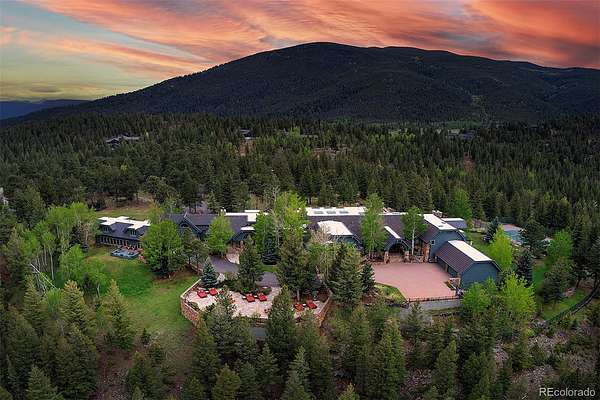 9.48 Acres of Land with Home for Sale in Evergreen, Colorado