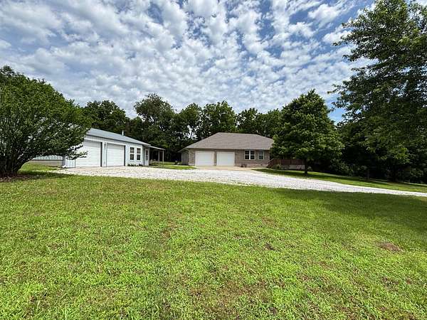 58.3 Acres of Recreational Land with Home for Sale in Aurora, Missouri