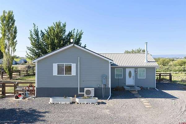 3.26 Acres of Land with Home for Sale in Olathe, Colorado