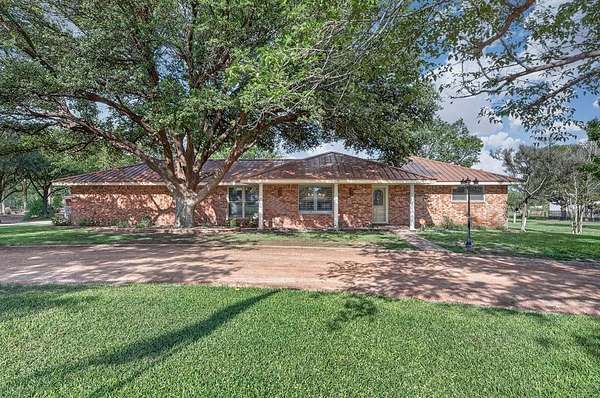 1.67 Acres of Land with Home for Sale in Midland, Texas