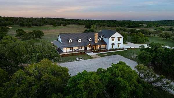116 Acres of Agricultural Land with Home for Sale in Fredericksburg, Texas