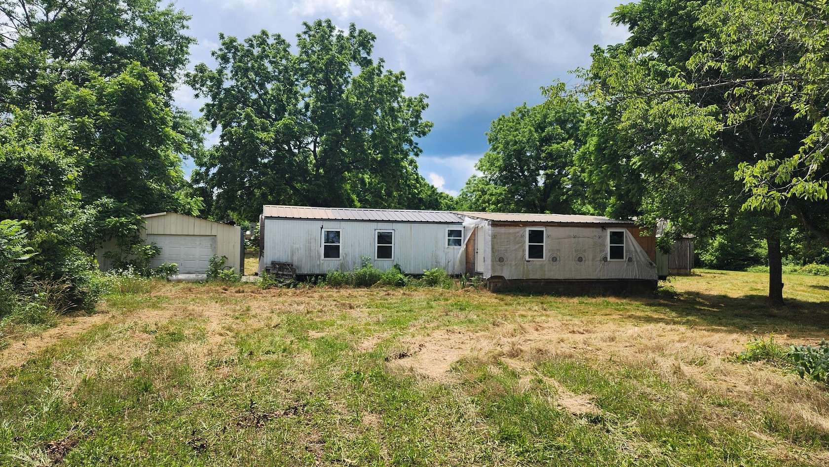 1.4 Acres of Land with Home for Sale in West Plains, Missouri