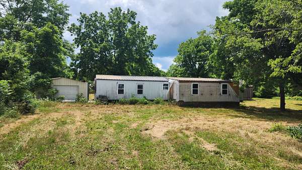 1.4 Acres of Land with Home for Sale in West Plains, Missouri