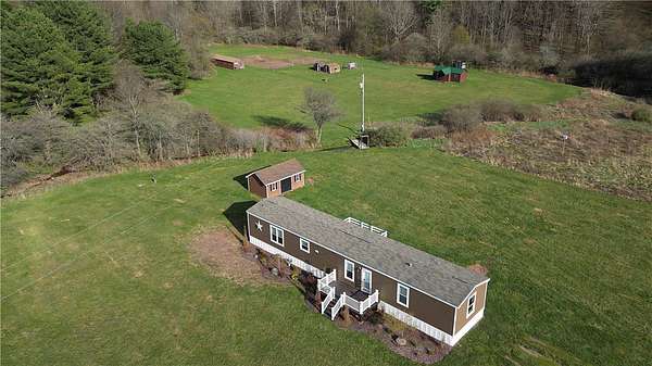 7.9 Acres of Land with Home for Sale in East Meredith, New York