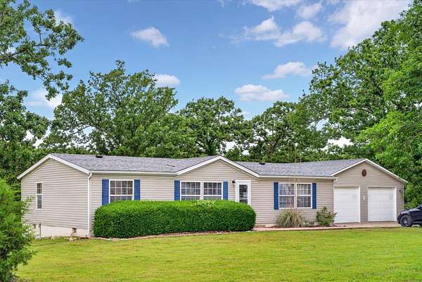 1.5 Acres of Land with Home for Sale in Wheatland, Missouri