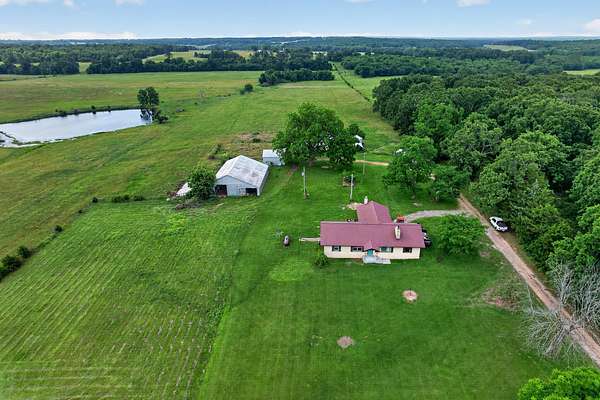 11.2 Acres of Land with Home for Sale in Conway, Missouri