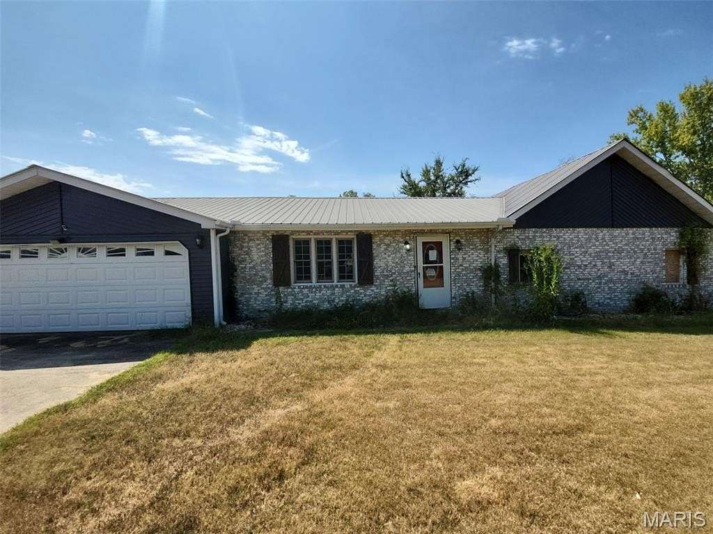 3.85 Acres of Land with Home for Sale in Sturdivant, Missouri