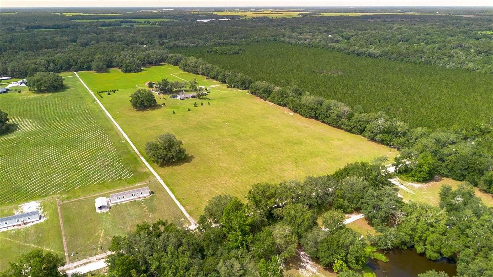 40 Acres of Land with Home for Sale in McAlpin, Florida