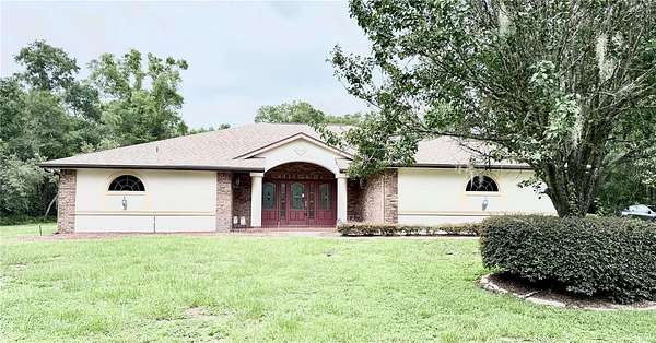 2.52 Acres of Land with Home for Sale in Inverness, Florida