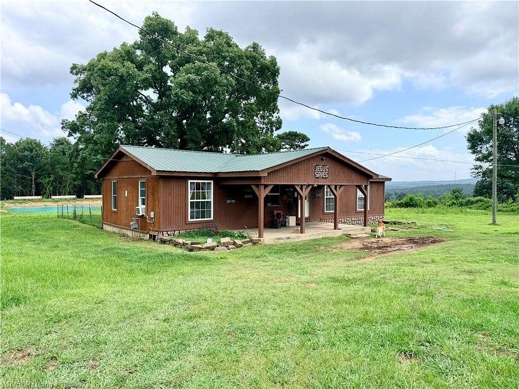 2.3 Acres of Land with Home for Auction in Booneville, Arkansas
