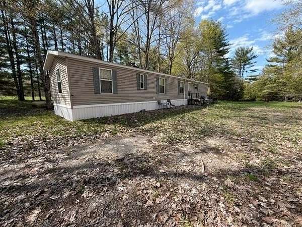 80 Acres of Recreational Land with Home for Sale in Posen, Michigan