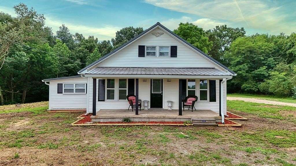5 Acres of Land with Home for Sale in McKenzie, Tennessee