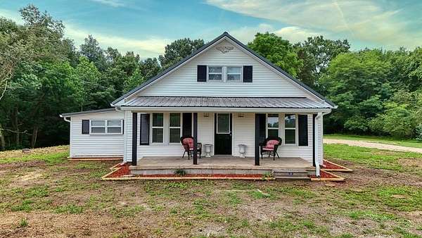 5 Acres of Land with Home for Sale in McKenzie, Tennessee