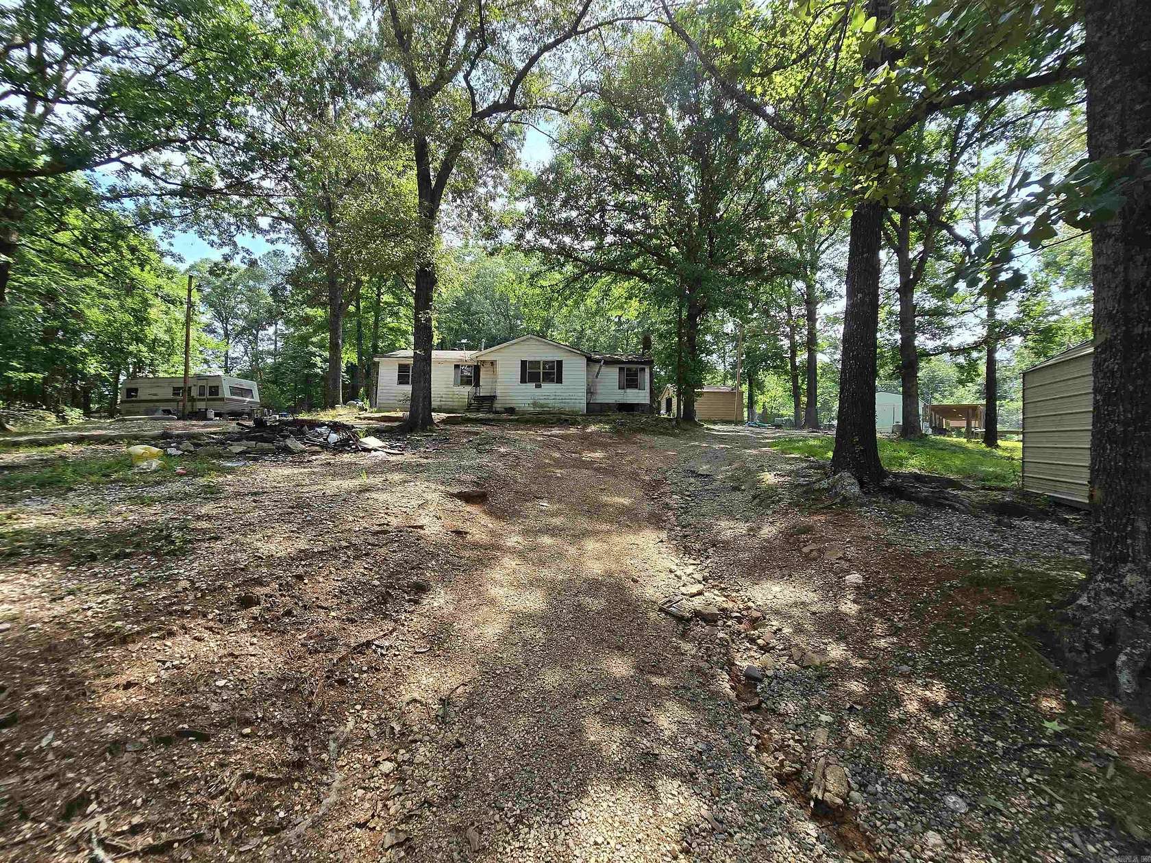 1.5 Acres of Land with Home for Sale in Benton, Arkansas
