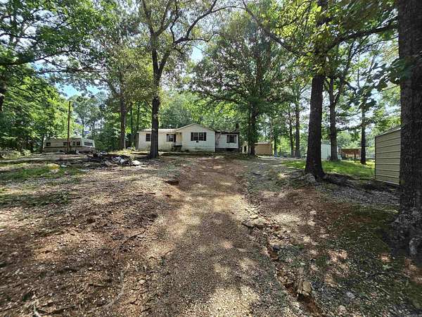 1.5 Acres of Land with Home for Sale in Benton, Arkansas