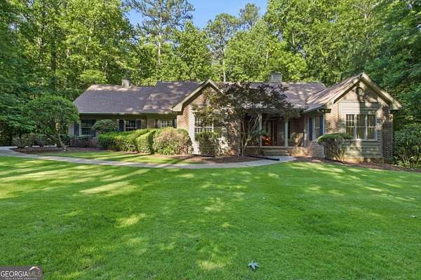 3.67 Acres of Land with Home for Sale in Suwanee, Georgia