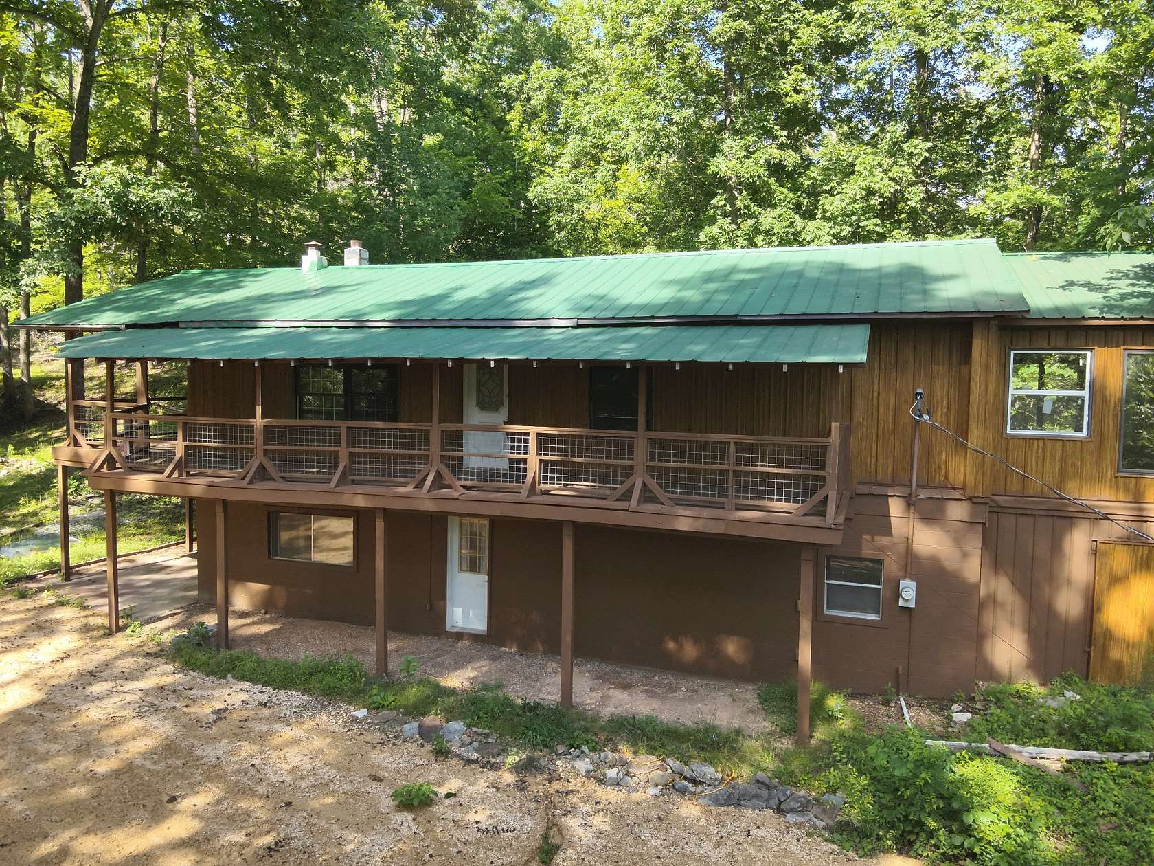 21.4 Acres of Land with Home for Sale in Linden, Tennessee