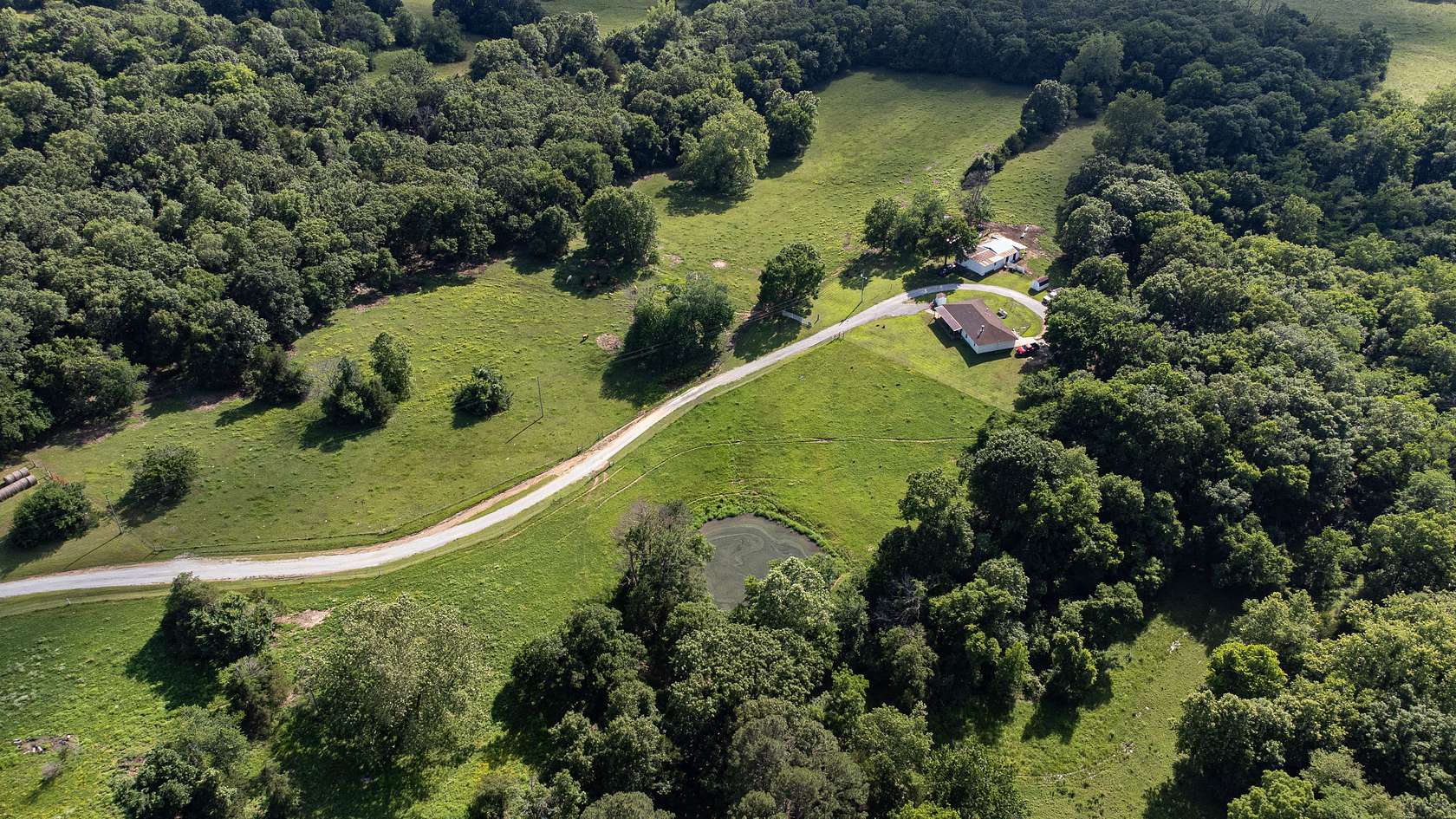 80 Acres of Land with Home for Sale in El Dorado Springs, Missouri