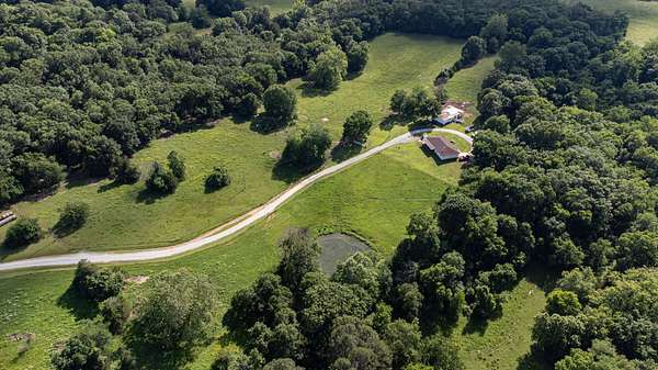 80 Acres of Land with Home for Sale in El Dorado Springs, Missouri