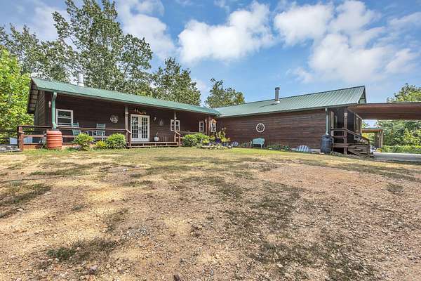15.2 Acres of Land with Home for Sale in Linden, Tennessee