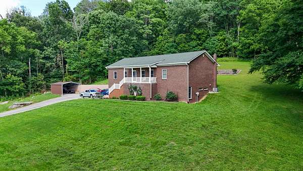 10.4 Acres of Land with Home for Sale in Culleoka, Tennessee