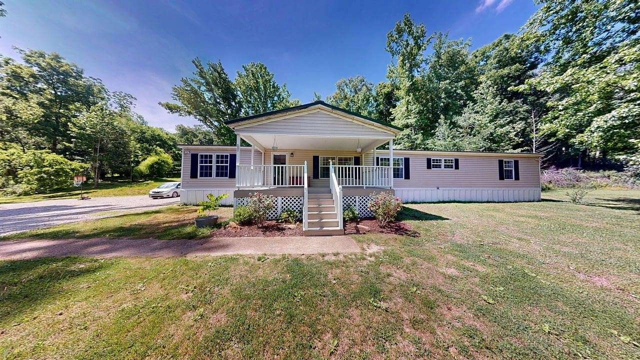 13.3 Acres of Recreational Land with Home for Sale in Hampshire, Tennessee