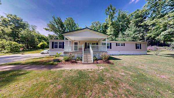13.3 Acres of Recreational Land with Home for Sale in Hampshire, Tennessee
