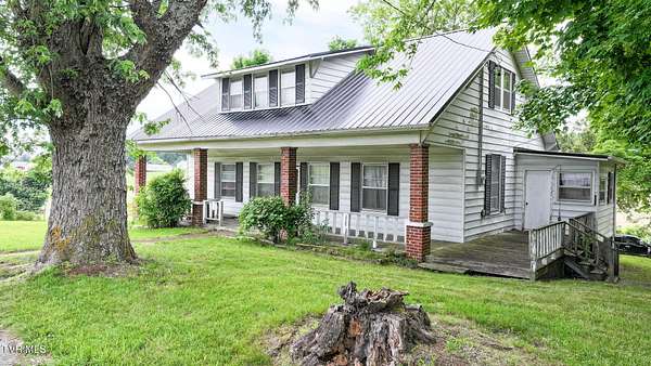 83.3 Acres of Agricultural Land with Home for Sale in Greeneville, Tennessee