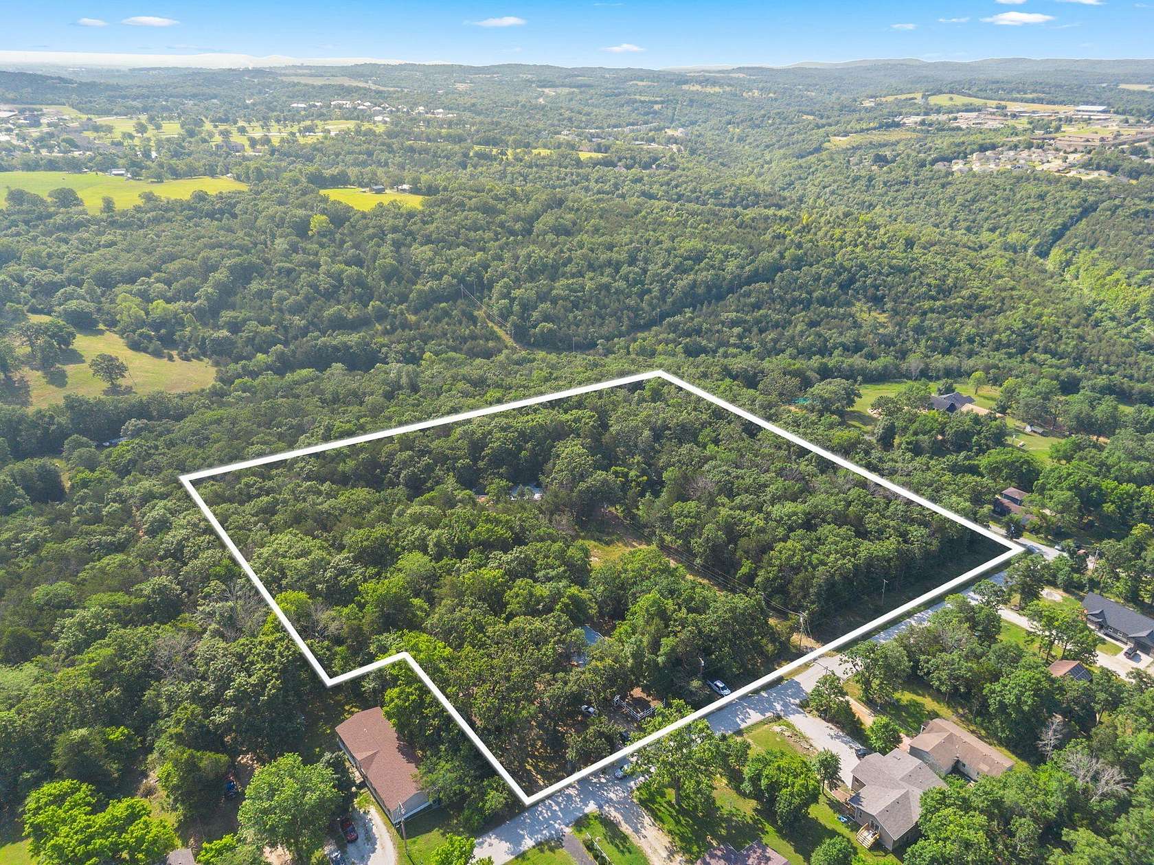 9.44 Acres of Land with Home for Sale in Branson, Missouri