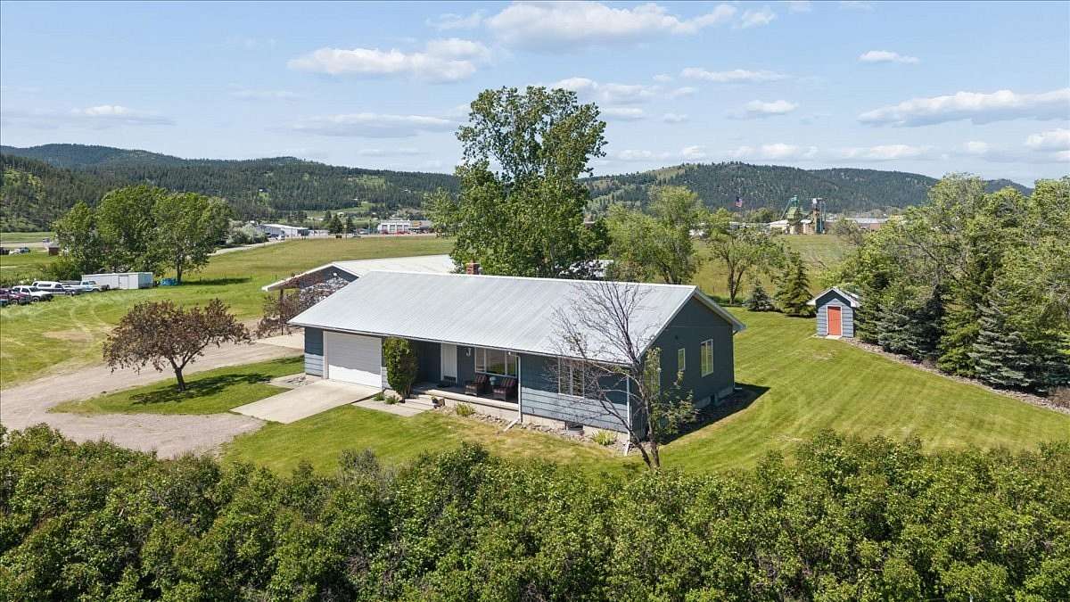 5 Acres of Land with Home for Sale in Kalispell, Montana