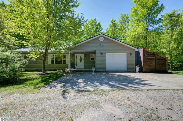 5 Acres of Land with Home for Sale in Alden, Michigan