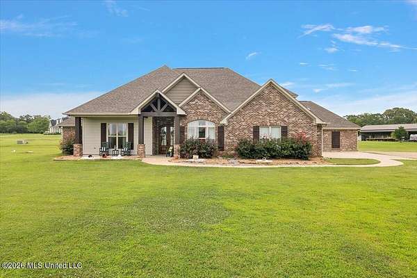 5 Acres of Land with Home for Sale in Flora, Mississippi