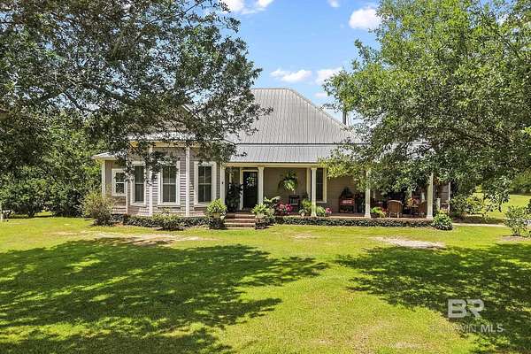 21.3 Acres of Land with Home for Sale in Elberta, Alabama