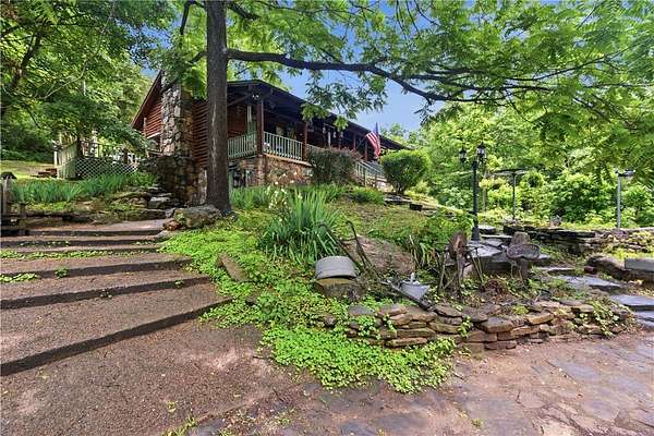 7.34 Acres of Land with Home for Sale in Berryville, Arkansas