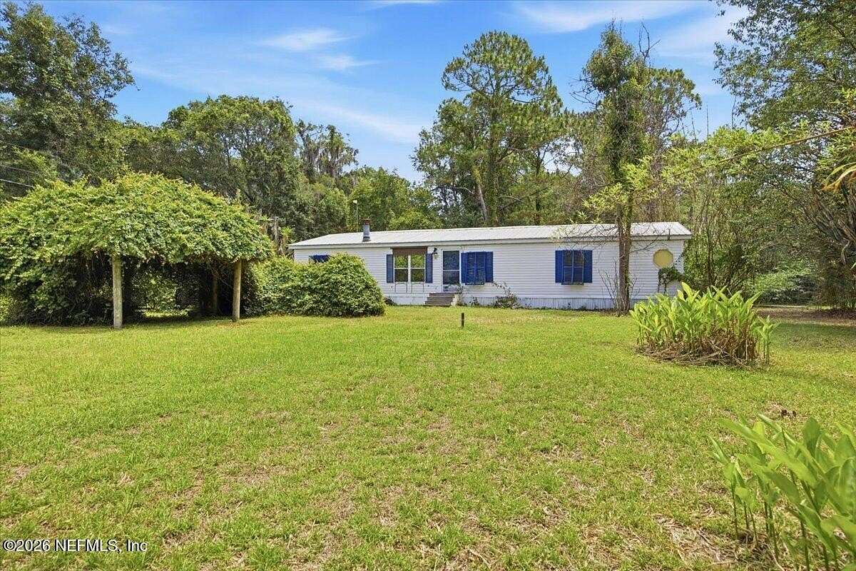 3.47 Acres of Land with Home for Sale in Crescent City, Florida