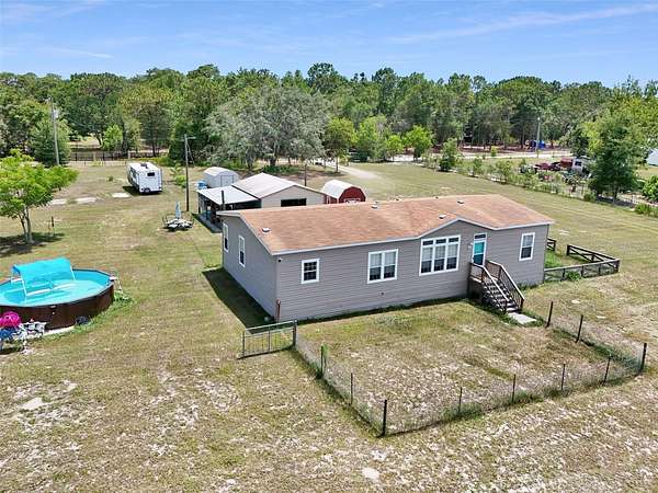 2.37 Acres of Land with Home for Sale in Spring Hill, Florida