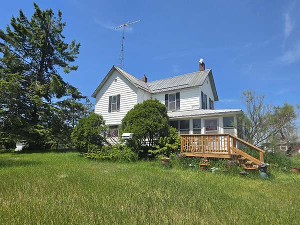 10 Acres of Land with Home for Sale in Fairview, Michigan