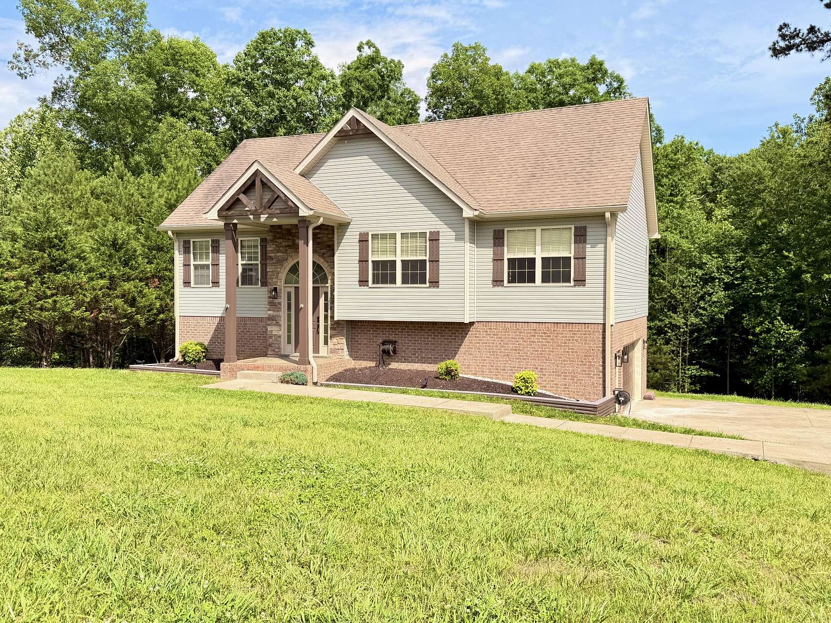 1.5 Acres of Land with Home for Sale in Cunningham, Tennessee