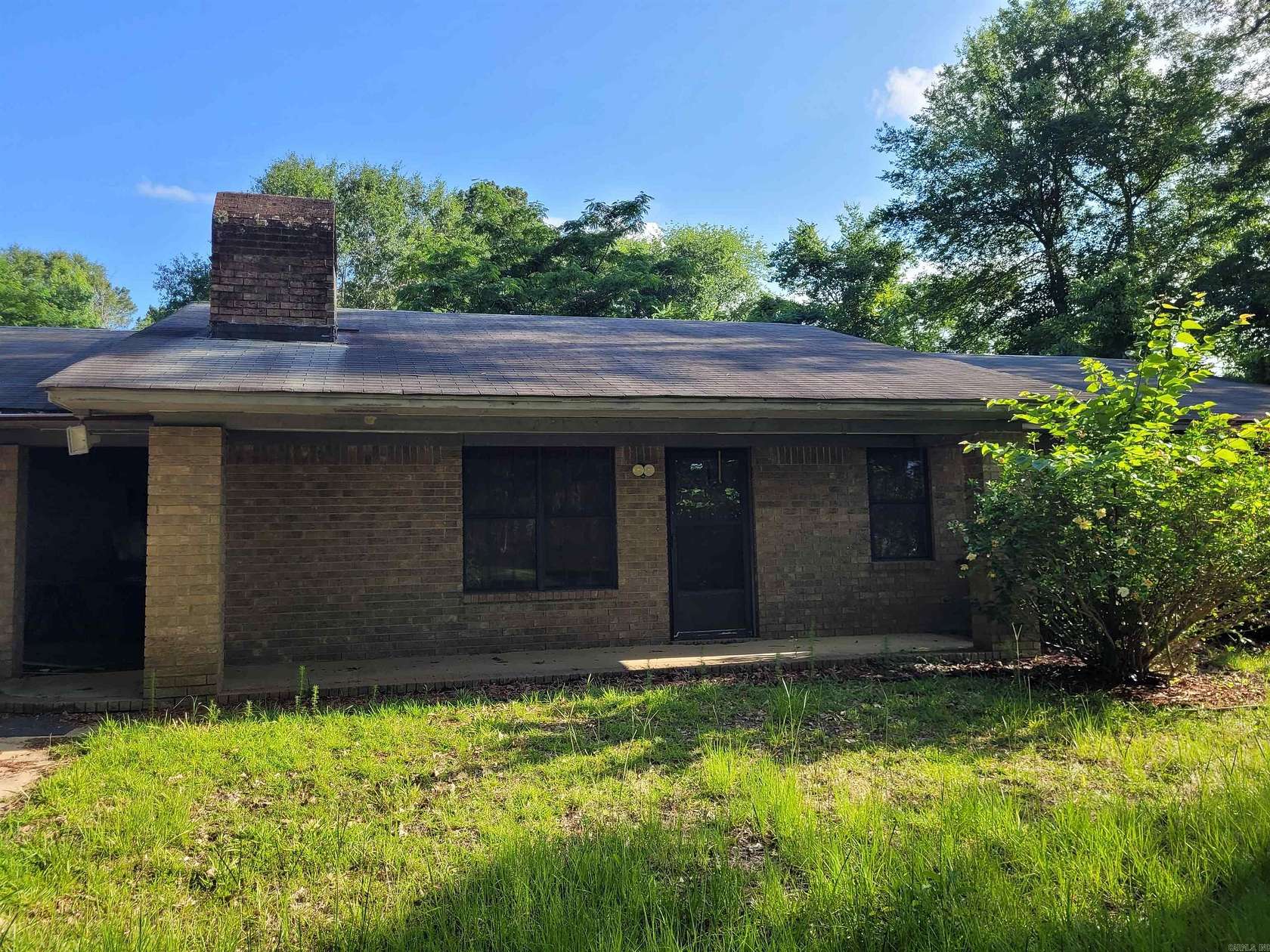 7.67 Acres of Land with Home for Sale in El Dorado, Arkansas