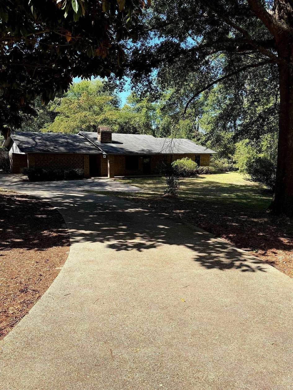 7.67 Acres of Land with Home for Sale in El Dorado, Arkansas