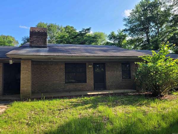 7.67 Acres of Land with Home for Sale in El Dorado, Arkansas
